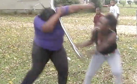 Never Underestimate The Big Mamas: Big Girl Beats A Young Hood Rat WIth Her Own Bat!
