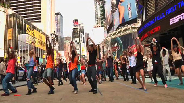 Flash Mob Performs Pop Star’s Hit in Times Square