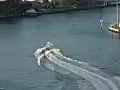 Royalty Free Stock Video HD Footage Zoom Out as Boat Passes by on the Intracoastal Waterway at Fort Lauderdale Beach as Viewed from the 29th Floor of a Condo