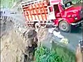 Landslide Takes Down Truck