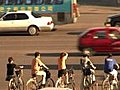 Beijing Cyclists Stopping At Cross Junction Stock Footage