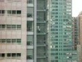 GUY CLIMBS THE TIMES BUILDING IN NYC