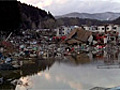 Japan tsunami victims take refuge in Buddhist temple - video