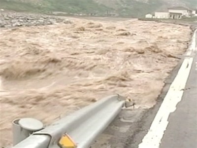 Rains wash away Chinese highway