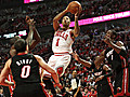 Rose,  Bulls romp Heat in Game 1