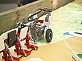 Kids compete using LEGO robot