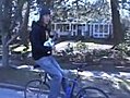 Playing a Ukulele Backwards on a Bike