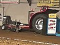 Indoor tractor-pulling accident