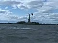 Kitesurfer flies high around Statue of Liberty