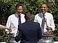 Barack Obama flips burgers for veterans
