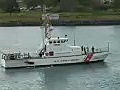 Royalty Free Stock Video HD Footage US Coast Guard Cutter Passing by at the Port of Honolulu,  Hawaii