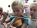 Instrumental petting zoo captivates children