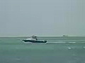 Royalty Free Stock Video HD Footage Power Fishing Boat Leaving Key Biscayne,  Florida