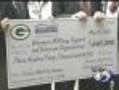 Organizations Receive Donation From Packers