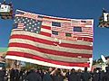 9/11 Flag Unfurled For Green Memorial