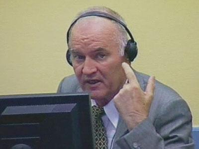 Raw Video: Defiant Mladic thrown out of court