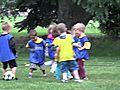 Little Kids play soccer