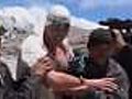 Man swims at base of Mount Everest