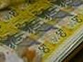 RBA guarded; Australian dollar falls