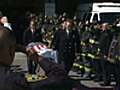 Raw Video: Flag-Draped Stretcher Gets Salute by Fellow Firefighters