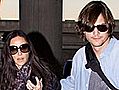 Demi Moore and Ashton Kutcher Touch Down in Brazil