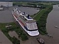 Giant cruise ship,  Celebrity Silhouette , squeezes through tiny canal on maiden voyage from Germany