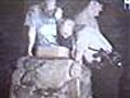 Raw Video: Police Pull Naked Man From Chimney