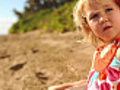 Little Girl and Father on the Beach