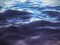 Slow motion water surface closeup.