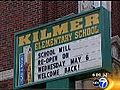 First local school to close for flu reopens