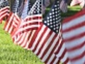 American Flags Blow in Breeze Closeup