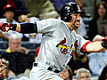 Punto,  Cards slip past Braves in 11th