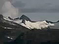 Royalty Free Stock Video SD Footage Zoom In and Out From a Large Mountain Range in Prince William Sound,  Alaska