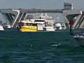 Royalty Free Stock Video HD Footage Boat Traffic and Causeway Bridge on the Intracoastal Waterway in Ft. Lauderdale,  Florida