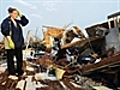 US tornado kills,  warnings more storms