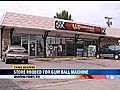 Surveillance Images Show Gum Ball Machine Theft