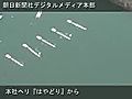 朝日レガッタ開幕で湖面を進む出走艇　滋賀県の県立琵琶湖漕艇場