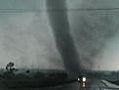 Raw: Massive tornado tears up structure
