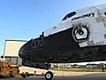 Close-up view of space shuttle Discovery being towed after its final mission.