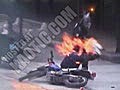 Greek Riot Cop Takes A Molotov Cocktail To The Head