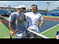 Pat Cash hits with John McEnroe