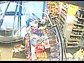 CCTV captures a car crashing into a shop
