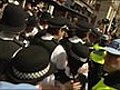 Watch                                     Minor scuffles at London rally