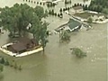 Flooding overwhelms parts of U.S.