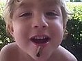 Three-Year-Old Plays with Cicada (in his Mouth)