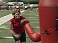 Charlie Strong Holds Women’s Football Clinic