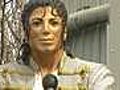 Al Fayed unveils Jackson statue.