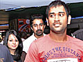 Dhoni,  wife Sakshi watch Action Replayy