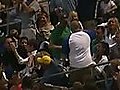 Father catches foul ball while holding his daughter