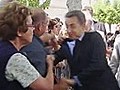 Raw video: Man yanks Sarkozy by shoulder